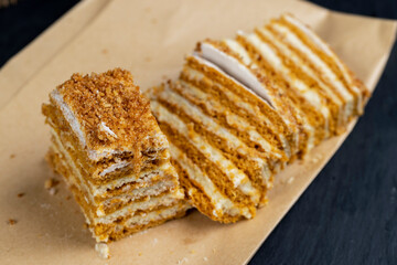 multi-layer cake with sponge cake with honey and buttercream