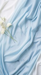 Pastel blue marble fabric with a touch of soft baby blue lace, showcasing innocence and purity. Wedding, fashion event. Vertical orientation. 