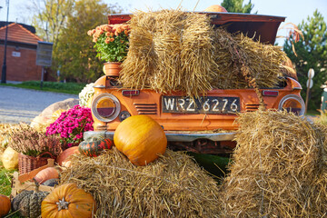 A fall harvest festival, the decorations created with hay pumpkins are just as indicative of the coming fall and approaching Halloween