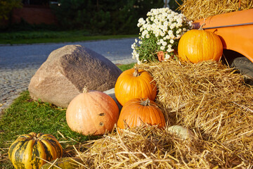 A fall harvest festival, the decorations created with hay pumpkins are just as indicative of the coming fall and approaching Halloween