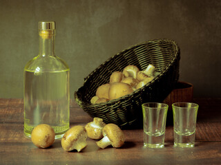 Antique-style still life with alcohol and mushrooms. - 651622578