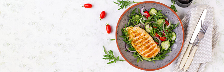Grilled chicken fillet and fresh salad. Healthy lunch menu. Keto food. Top view, banner