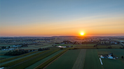 An Aerial View of an Early Morning Sunrise, Over Rural America, on a Summer Day