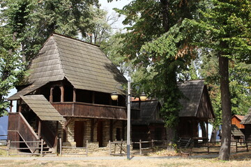 A wooden building with a metal roof