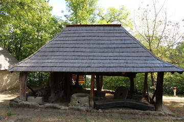 Fototapeta na wymiar A small hut with a sign