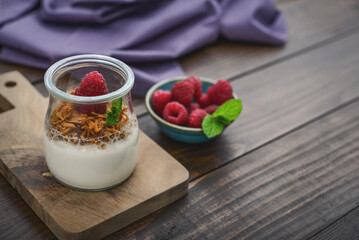 Dessert panna cotta with caramel cheese and fresh raspberry
