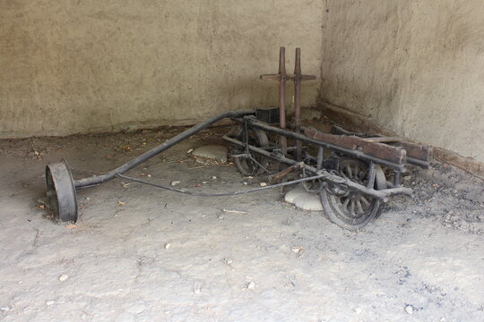 A wooden wagon with wheels