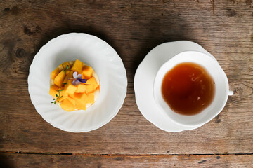 mango cake or mango cheese cake , mango cheese pie and hot tea