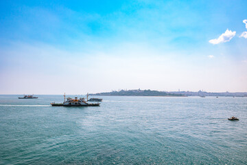Istanbul view with ferries or ships from Maiden's Tower or Kiz Kulesi
