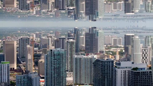 Aerial mirror reflection of a city Brickell Miami