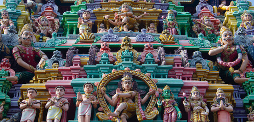 Beautiful idol of Shiva, other gods and saint in one of the tower of Arulmigu Arunachaleswarar Temple, Tiruvannamalai which represent element of fire. - obrazy, fototapety, plakaty
