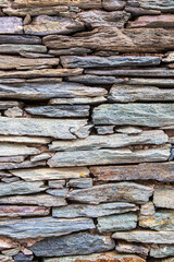Steinmauer , aufeinander geschichtete Steine, Naturstein gestapelt 