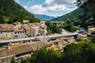 Fototapeta na wymiar View on the roofs of Pontaix medieval village and the Drome river in the South of France