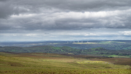Several large wind turbines seen from Cuilcagh Boardwalk. Irish green wind energy generation. County Fermanagh, Northern Ireland