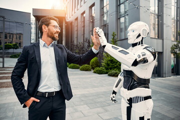 Robot with businessmen on the street near the building