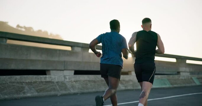 Friends, running and workout with diversity, training and communication with sportswear in marathon. Motivation, fitness and teamwork, commitment and practice with city background in race challenge