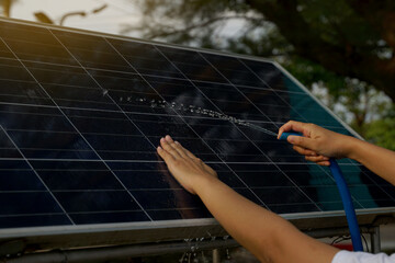 cleaning solar panels, Electric power supply, path lamp by using water to wash and rub hands to...