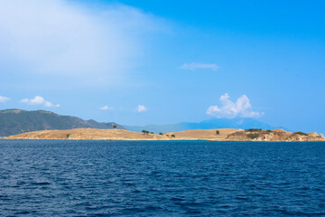 Greece landscape with islands, beautiful water and blue sky