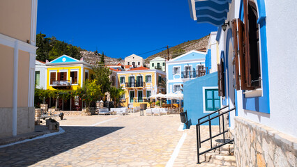 Meis (Megisti, Kastelorizo), the smallest of the twelve islands of Greece in the Aegean Sea, has houses with historical architecture and clear sea. - obrazy, fototapety, plakaty