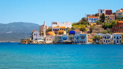 Rolgordijnen Meis (Megisti, Kastelorizo), the smallest of the twelve islands of Greece in the Aegean Sea, has houses with historical architecture and clear sea. © HAYRULLAH