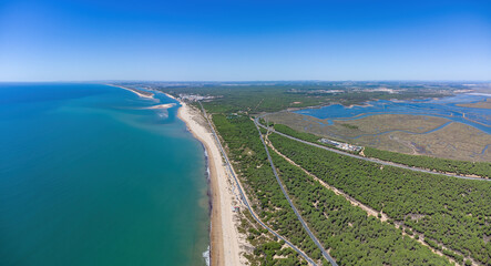 Aerial Panoramic view of Punta Umbria beach looking to El Portil and El Rompido Beaches in Huelva province, Andalusia, Spain - obrazy, fototapety, plakaty
