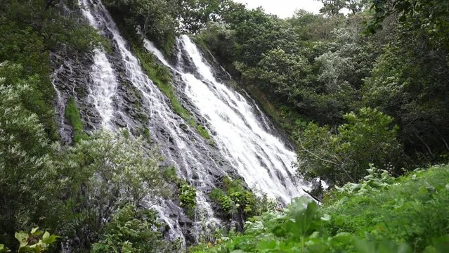 Hokkaido,Japan - September 7, 2023: Slow motion of Oshinkoshin Falls on the Shiretoko Peninsula
