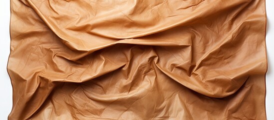 Obraz premium Top view of a crumpled parchment or baking paper on a white background with empty space for text