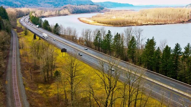 Highway Harmony: Columbia River Gorge with Mountain Views and Freeway Traffic in 4K Video