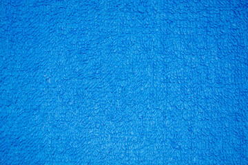 Photo Blue Knitted Background. The background is blue. Background knitted terry fabric - obrazy, fototapety, plakaty