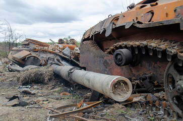 IRPIN, UKRAINE - Broken tanks, combat vehicles and other burnt military equipment of the Russian invaders in Irpin,The russian tank burned by the Ukrainian army. Kiev region