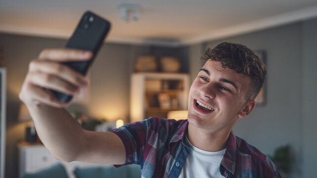One man caucasian male teenager boy take selfie photos or video call