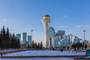 Panoramic view of Baiterek Tower on Nurjol Boulevard. Urban landscape of sunny winter day in city...