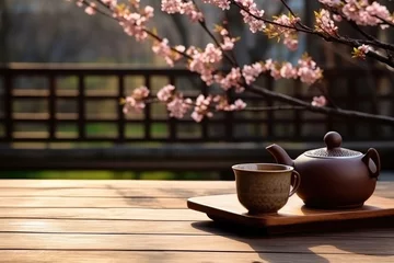Foto op Canvas Some tea sets are placed on the outdoor countertop © evening_tao
