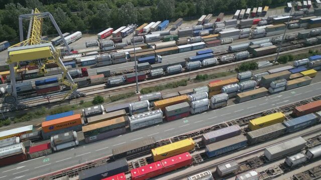 Aerial view of a road-rail transshipment terminal in Italy. The cargo begins its journey by train and is picked up by a truck to its final destination by road.