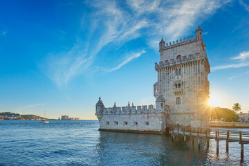 Belem Tower or Tower of St Vincent - famous tourist landmark of Lisboa and tourism attraction - on the bank of the Tagus River (Tejo) on sunset. Lisbon, Portugal