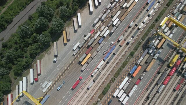 Aerial view of a road-rail transshipment terminal in Italy. The cargo begins its journey by train and is picked up by a truck to its final destination by road.