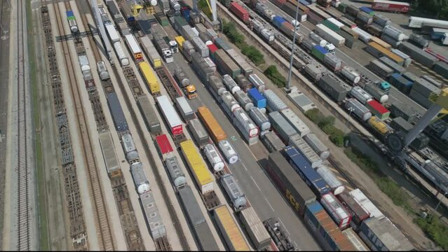 Aerial view of a road-rail transshipment terminal in Italy. The cargo begins its journey by train and is picked up by a truck to its final destination by road.