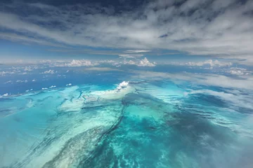 Foto op Plexiglas Where the sea meets the sky, the caribbean from 20,000 feet © Hali
