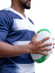 Digital png photo of happy biracial rugby player holding ball on transparent background