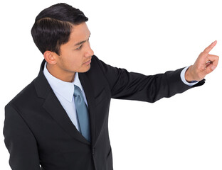 Digital png photo of focused asian businessman pointing with finger on transparent background