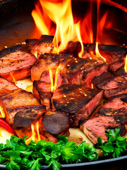 steak cooking on fire with vegetables, bbq grill with flames, cooking juicy delicious beef meat-AI generated