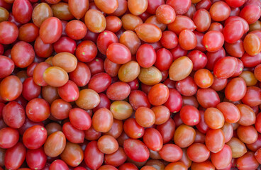 fresh juicy cherry tomato as food background