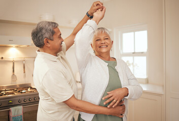 Old couple, dancing in kitchen with love and bonding, love and energy with support and life partner...