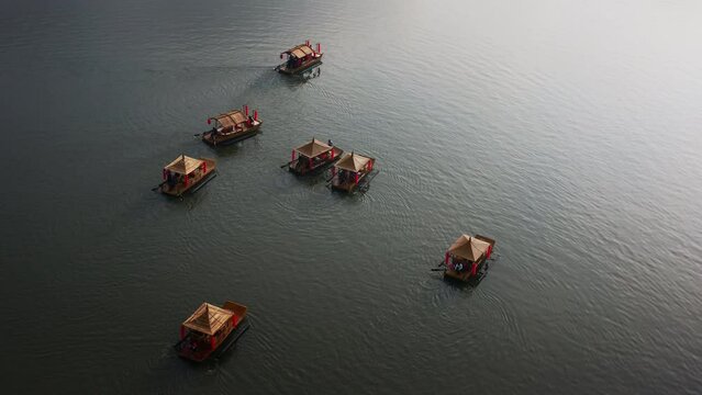 Asian chinese boats on a lake in Thailand. Aerial shot 