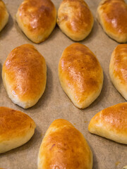 Yeast dough Pies with stuffing on a plate.