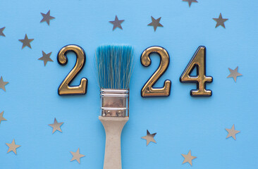 2024 on blue background with silver stars and with paint brush instead zero