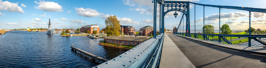 Naklejka premium Panoramic view from the Kaiser-Wilhelm-Bridge over the Ems-Jade Kanal in Wilhelmshaven, Germany