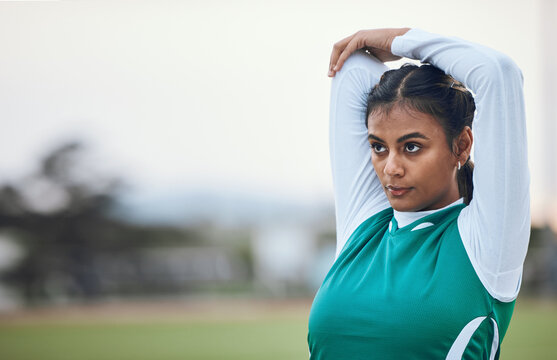 Thinking, stretching and a woman hockey player getting ready for the start of a game or competition outdoor. Sports, fitness and warm up with a young athlete on a field for a training workout - Powered by Adobe
