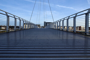 Newport City footbridge is a pedestrian and cycle bridge over the River Usk, in the city of Newport, South Wales, United Kingdom. - obrazy, fototapety, plakaty