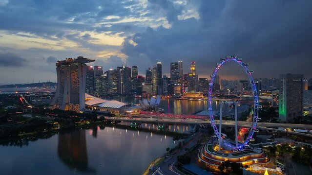 Aerial view of Singapore city at night.